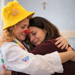 Un abbraccio a una mamma