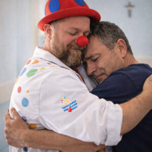 Un abbraccio a una papà